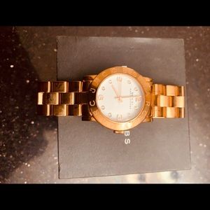 Used Marc Jacobs women’s luxury rose gold watch.